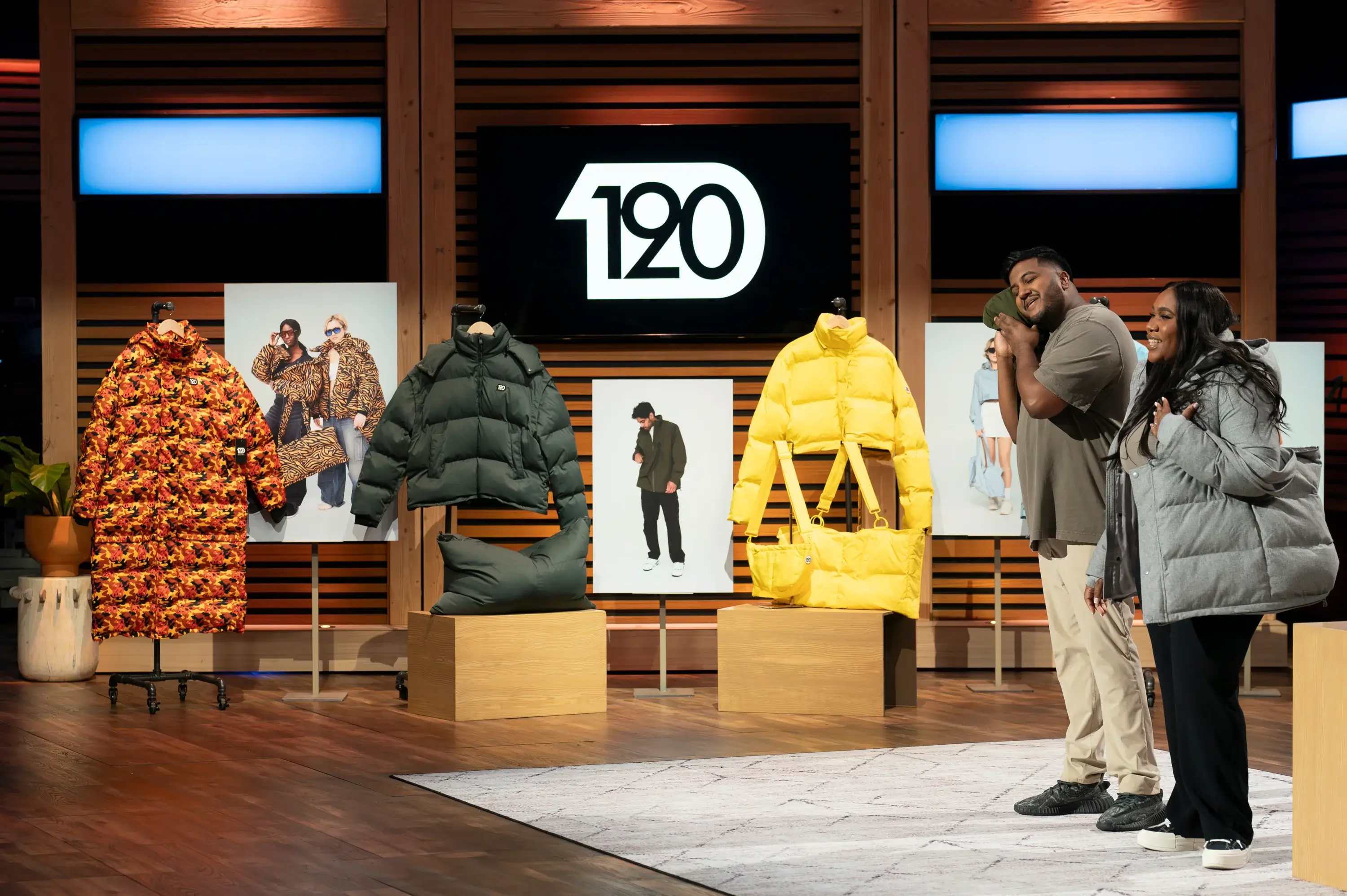 Ashley Sankar demonstrating the convertible jacket functionality in the Shark Tank