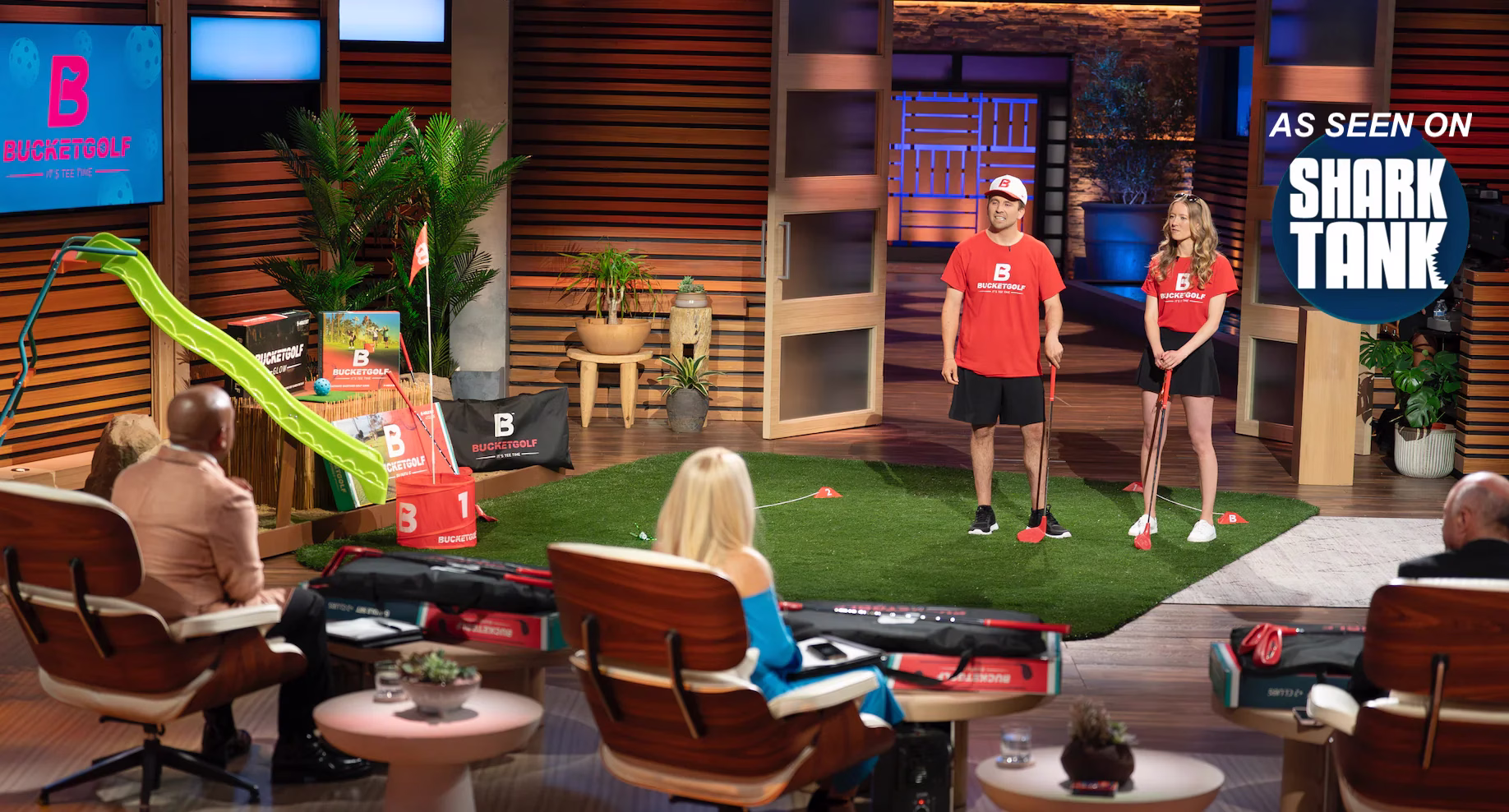 Tyler and Jenny Simmons demonstrating BucketGolf to the Sharks