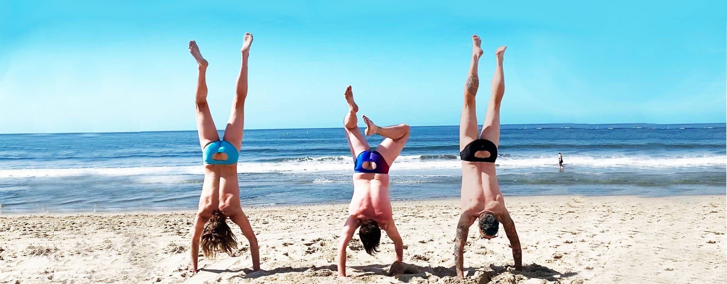 Friends wearing various colorful patterns of Moonies swimwear at a pool party