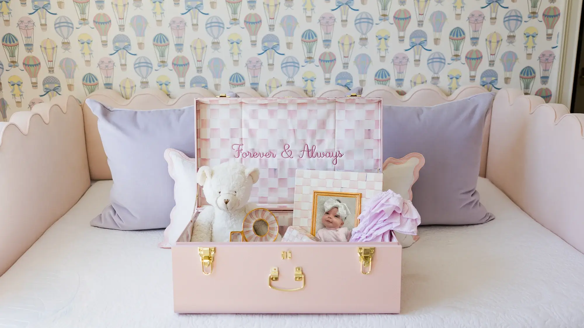 Custom embroidery process for a luxury Petite Keep memory trunk