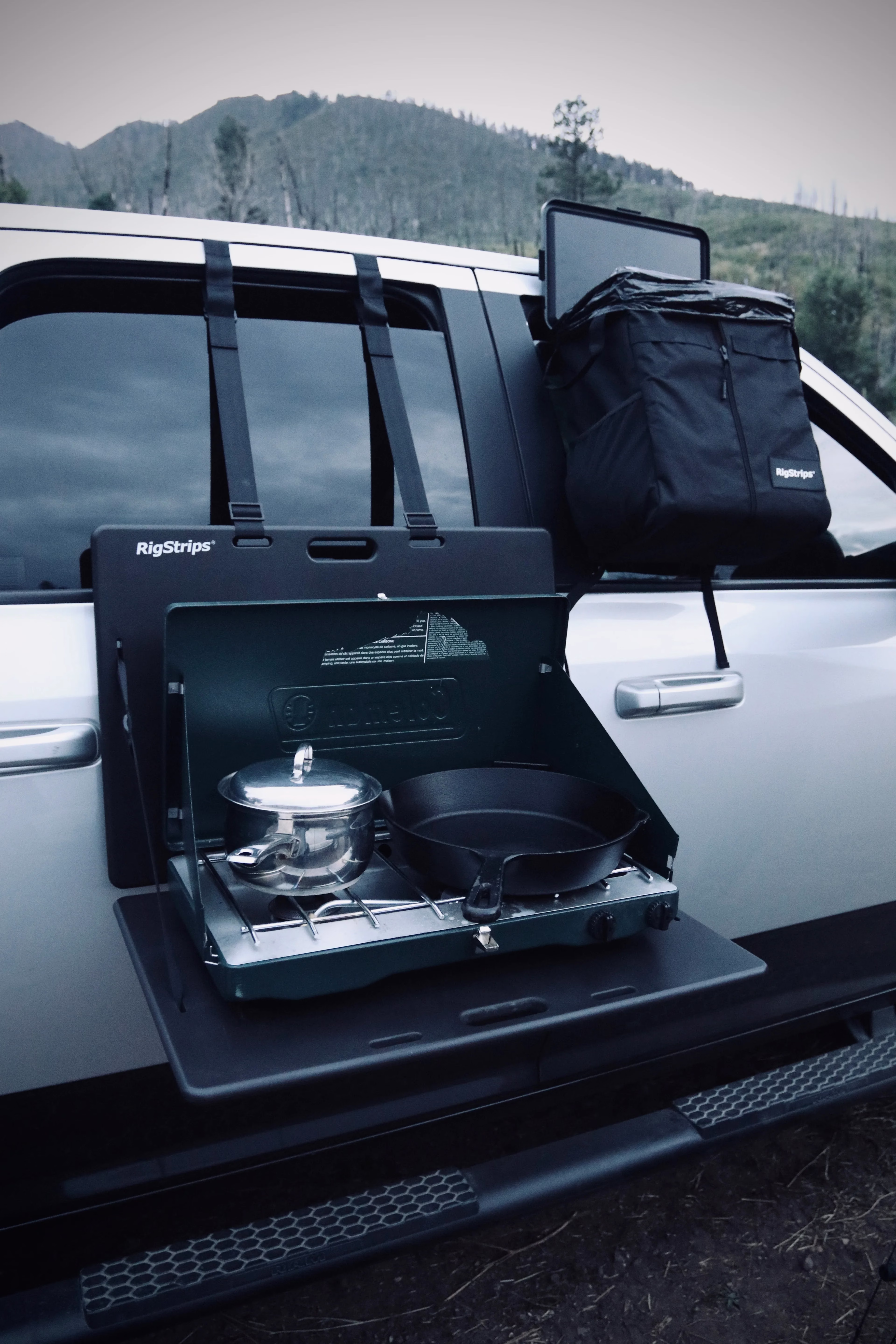 SnoStrip by RigStrips magnetically holding skis and snowboards on a truck