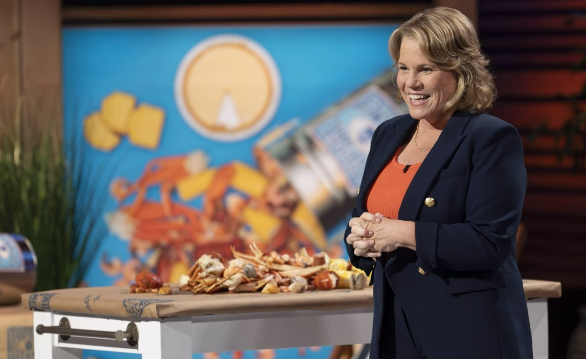 Danielle Mahon cooking the Topsail Steamer seafood boil in front of the Sharks