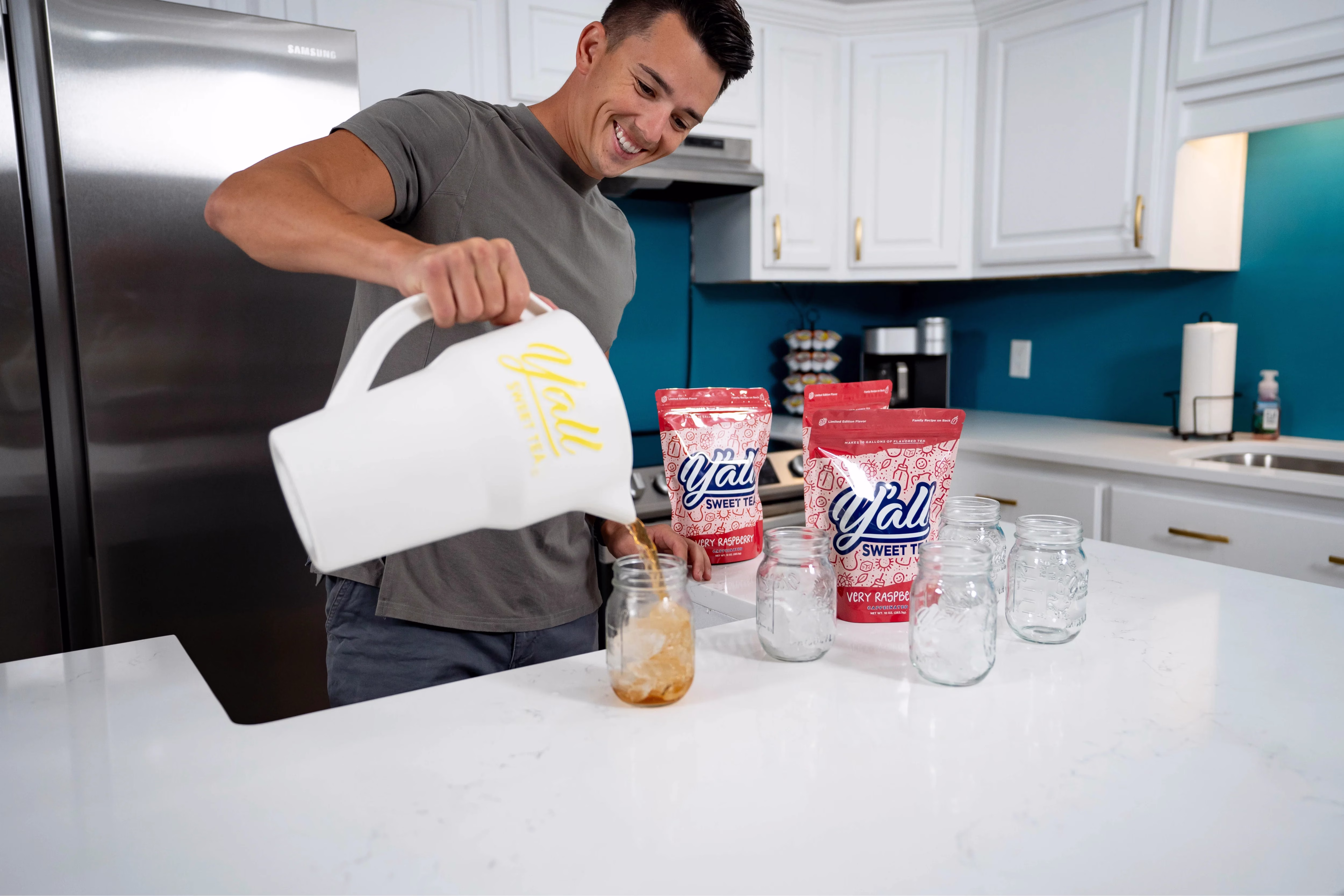 An assortment of Y'all Sweet Tea products and branded merchandise